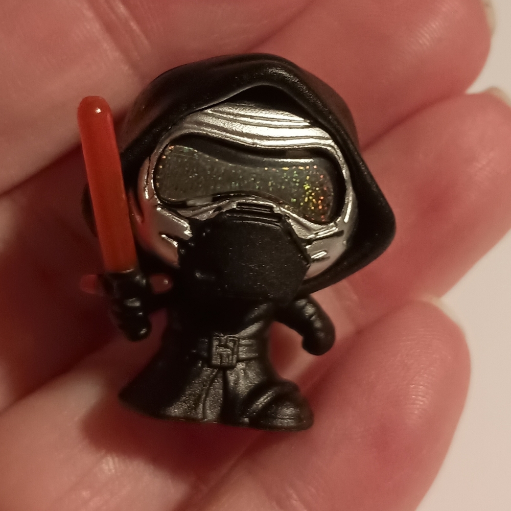 Miniature Black Hooded Figure with Red Sword